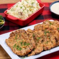 Chicken Fried Steak ~ Party Pack · four fried steaks · jalapeño gravy · choice of four individual sides · family size House Sal...