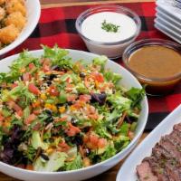 Steak Salad ~ Family Size · grilled sirloin · mixed greens · carrots · tomatoes · pico de gallo · roasted corn · black b...