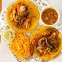 Chicken  Fajita · Two tender marinated and flame-grilled chicken with grilled onion and bell peppers on a corn...