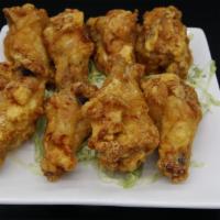 Chicken Wings (8) · Fried chicken wings.