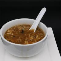 Hot And Sour Soup · Bean curd, bamboo shoots and wood ear mushrooms with hot white pepper, vinegar and broth.