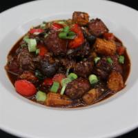 Asian City Black Pepper Beef · Chunks of beef, onions, green and red bell pepper, in a butter and black pepper sauce. Serve...