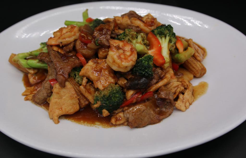 Triple Delight · Beef, chicken, shrimp and mixed vegetables stir fried with brown sauce.