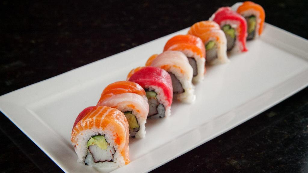 Rainbow Roll · Kani, cucumber, avocado, rice, seaweed, tuna, fresh salmon, white fish, massago.