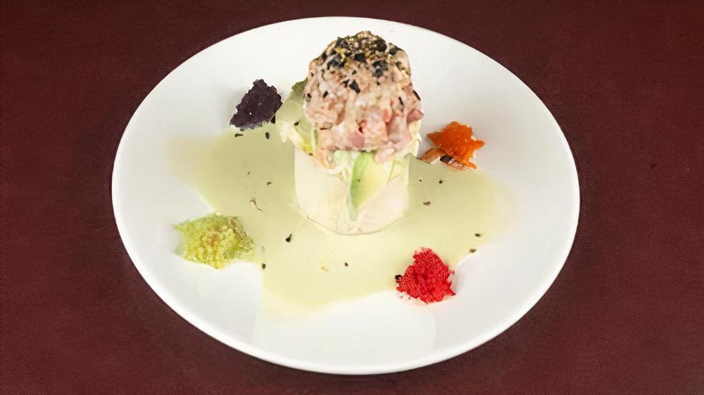 Towers /Tuna · A foundation of sushi rice layered with Tampa Bay sauce, masago and sliced avocado topped with spicy tuna. Sprinkled with furikake and drizzled with wasabi cream sauce. The Tower is prepared tableside and garnished with orange tobiko, black tobiko, wasabi tobiko and habanero masago.