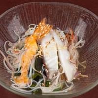 Spec Sunomono · Shrimp, octopus, kanikama crab, cucumber and wakame seaweed in a sweet vinaigrette dressing ...