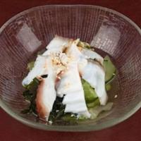 Oct Sunomono (3Pd) · Cucumber and wakame seaweed in a sweet vinaigrette dressing topped with sesame seeds.