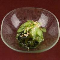 Plain Sunomono (3Pd) · Cucumber and wakame seaweed in a sweet vinaigrette dressing topped with sesame seeds.
