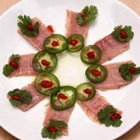 Razor /O-Toro · Thinly sliced fish topped with cilantro, freshly sliced jalapeños and sriracha sauce finishe...