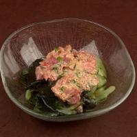 Sp-Tuna Sunomono (3Pd) · Spicy tuna topping on a cucumber and wakame seaweed, and a touch of sweet vinegar dressing t...