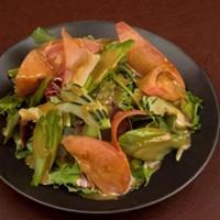 Garden Salad · Spring mix with asparagus, cucumbers and tomatoes. Served with your choice of Miso-Sesame or...