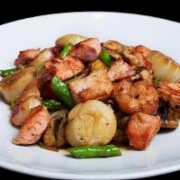 Seafood Teppan · lightly seasoned and grilled salmon, scallops, and shrimp; served with al-dente teppan-grill...