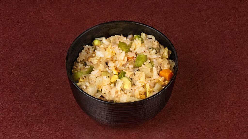 Veg Yakimeshi · Teppan-fried Japanese rice, eggs, carrots, zucchini, peppers, onions.