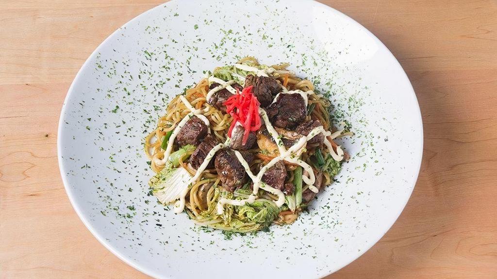Beef Yakisoba · Stir fried noodles with vegetables in Yakisoba Sauce drizzled with Japanese mayo and grated ginger.