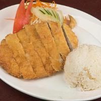 Chk Katsu Curry · Panko-breaded Chicken served with rice, sliced cabbage, carrots, tomato and cucumber.