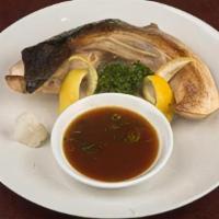 Hamachi Kama · Teppan-grilled yelllowtail cheek. Served with our special Joy Sauce and green onions. Rich i...