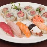 Sushi Sampler · Assortment of nigiri and sushi including tuna, salmon, yellowtail, octopus and shrimp with c...