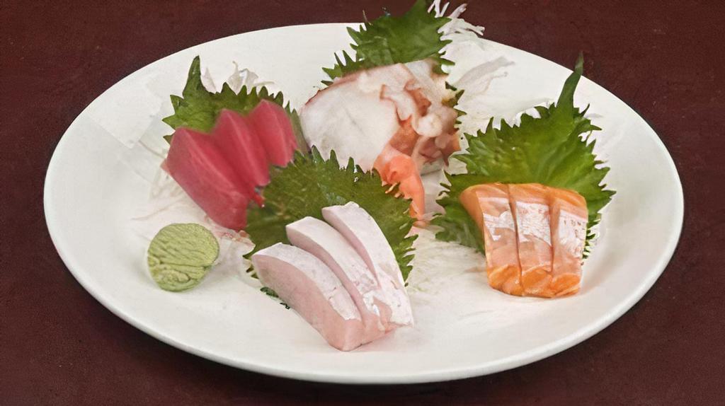Sashimi Sampler · Assortment of sashimi: Tuna, salmon, yellowtail and octopus.