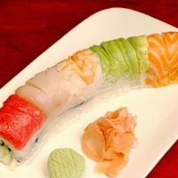 Rainbow Roll · Kanikama, avocado, cucumber, wrapped with yellowtail, avocado, tuna, shrimp, salmon, uramaki...