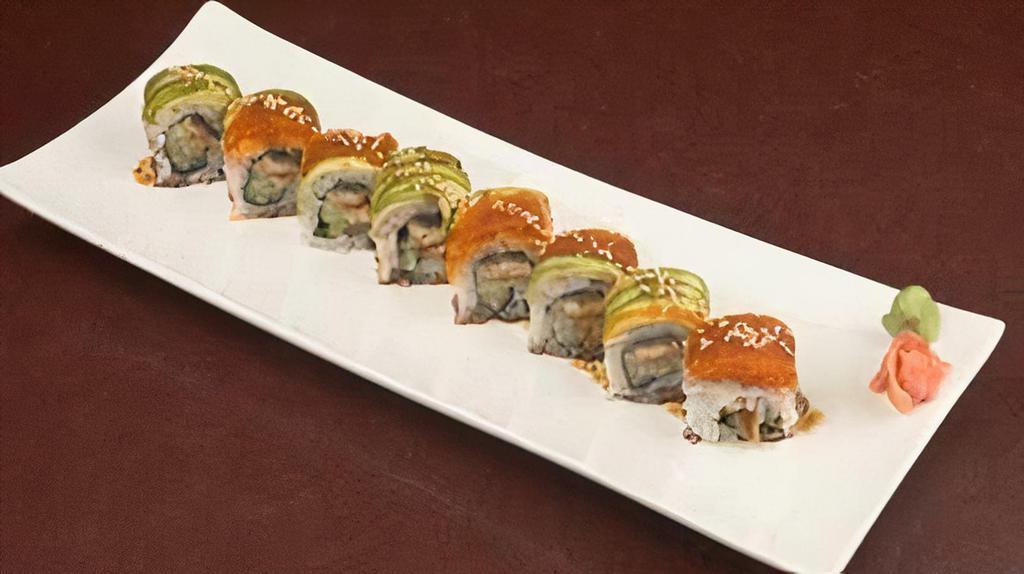Dragon Roll · Unagi eel, cucumber, wrapped with avocado, Masago caviar, sesame seeds, Eel sauce, uramaki style