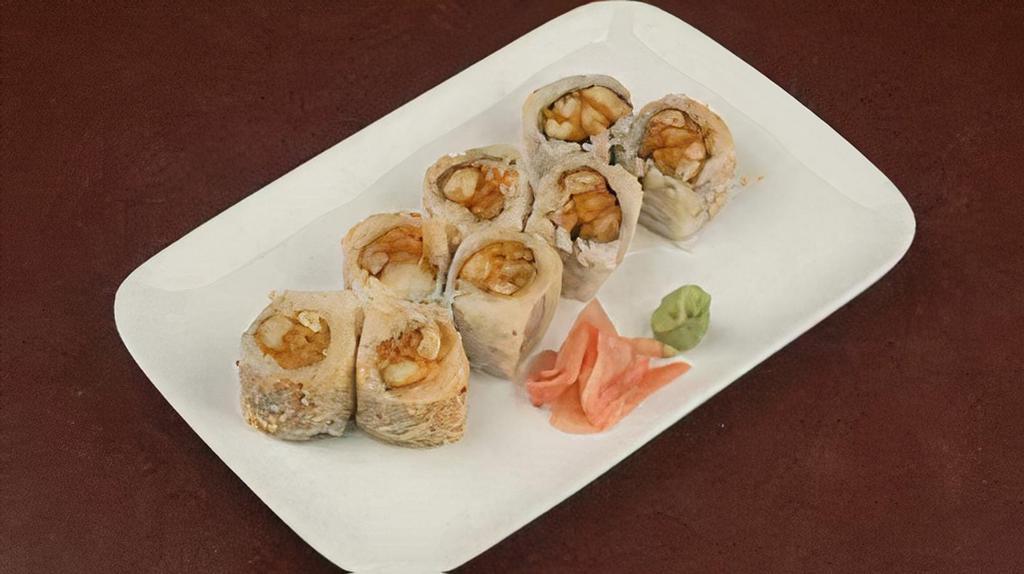 Cajun Roll · Fried crawfish, spicy mayo, sesame seeds, uramaki style.