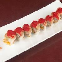 Austin Roll · Kanikama crab, tempura fried julienne carrots and avocado rolled uramaki style. Topped with ...