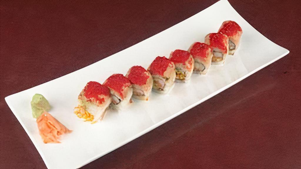 Austin Roll · Kanikama crab, tempura fried julienne carrots and avocado rolled uramaki style. Topped with spicy tuna and habanero Masago. Drizzled with Spicy Sashimi sauce
