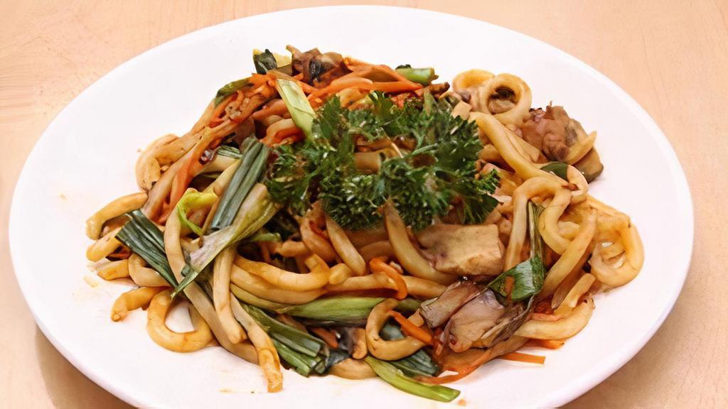 Chicken Yakiudon · Stir fried thick white wheat-flour noodles with vegetables and Chicken in Yakisoba Sauce.