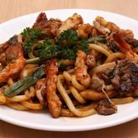 Combo Yakiudon · Stir fried thick white wheat-flour noodles with vegetables and a combination of Beef, Chicke...