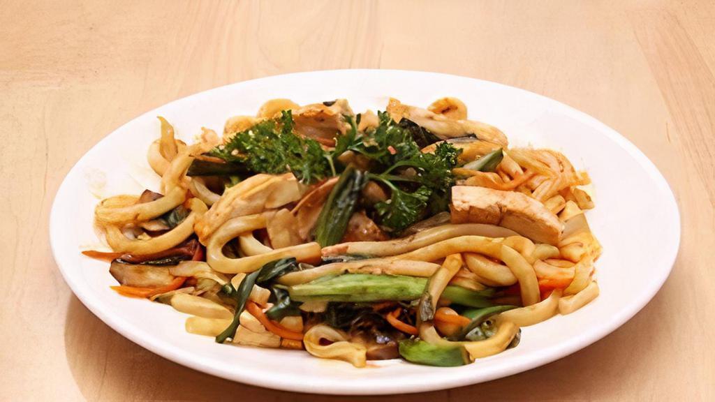 Tofu Yakiudon · Stir fried thick white wheat-flour noodles with vegetables and tofu in Yakisoba Sauce.