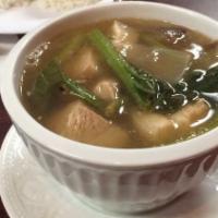 Pork Tamarind Soup (Sinigang) · Sour soup made with pork, vegetables, and tamarind flavored broth.