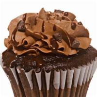 Triple Chocolate · A fudgy chocolate cupcake with chocolate buttercream frosting and chocolate chips