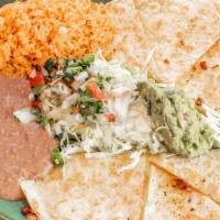 Quesadilla Plate · Large quesadilla with your choice of meat with rice, beans, pico de gallo, guacamole, sour c...