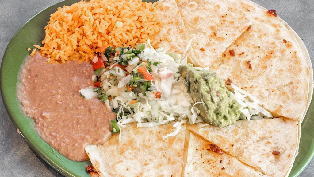 Quesadilla Plate · Large quesadilla with your choice of meat with rice, beans, pico de gallo, guacamole, sour cream and salad.
