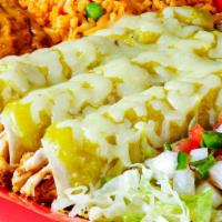 Enchiladas · Three red or green enchiladas, cheese, chicken or beef. Served with rice and refried beans.