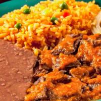 Fajita Ranchera · Chopped beef fajita topped with our delicious ranchero sauce and sauteed onions served with ...