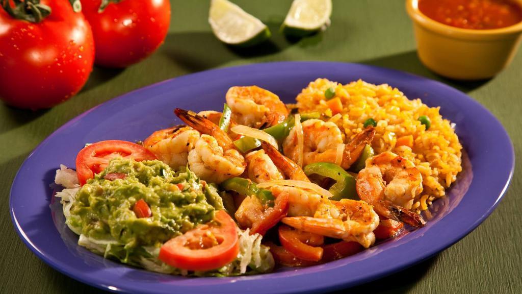 Camarones A La Plancha · Sauteed grilled shrimp served with rice, lettuce, tomato and guacamole.