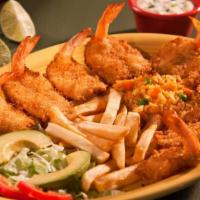 Camarones Empanizados · Breaded shrimp served with rice, lettuce, tomato and french fries.