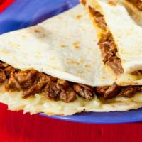 Kids Quesadilla · Includes rice, beans, and kids fountain drink.