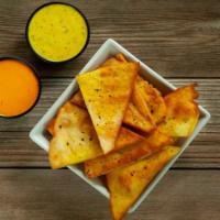 Naan Chips & Dips · Flash fried house-prepared naan chips served with your choice of 2 dipping sauces