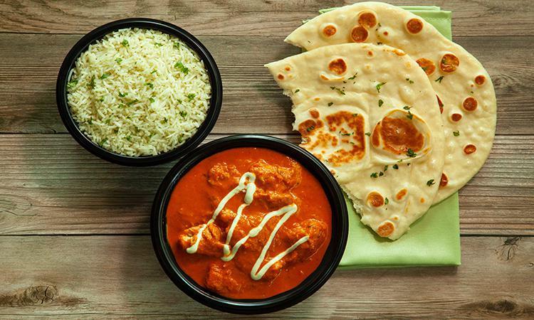 Bowl - Tikka Masala · Our tikka masala sauce with herbs and spices topped with mint yogurt and cilantro and your choice of filling. Served with naan bread and basmati rice.