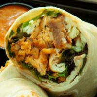 Wrap - Butter Sauce · Made from scratch wraps rolled in our house-prepared naan bread filled with power greens, sh...