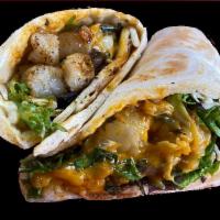 Wrap - Tomato Chutney · Made from scratch wraps rolled in our house-prepared naan bread filled with power greens, sh...
