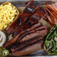 The Sampler (3 Meat) · Brisket, spare ribs, and sausage.