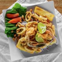 Jalea Personal · Mix of lightly fried seafood, served with homemade salsa criolla, yucca and cancha.