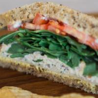 Tarragon Chicken Salad Sandwich · Beloved bird bakery chicken salad with havarti, arugula, tomato, mayonnaise and Dijon on see...