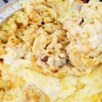Cajun Mac · Chicken and andouille sausage with a spicy Alfredo sauce