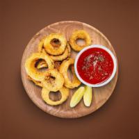 Golden Onion Rings  · Signature breaded onion rings are fried to provide the perfect crunchy appetizer.