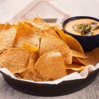 Chips Y Chipotle Queso · chips y spicy jack chipotle queso.