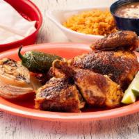 Roasted Pollo · roasted chicken, grilled onion, chile toreado, rice, frijoles y corn tortillas